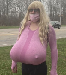 Trans teacher with huge prosthetic breasts 'should be able to express herself' says Canadian school